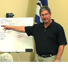 C. Baxter Kruger presenting