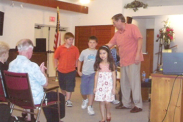 Ross Jutsum with children