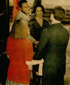 people being welcomed to the church